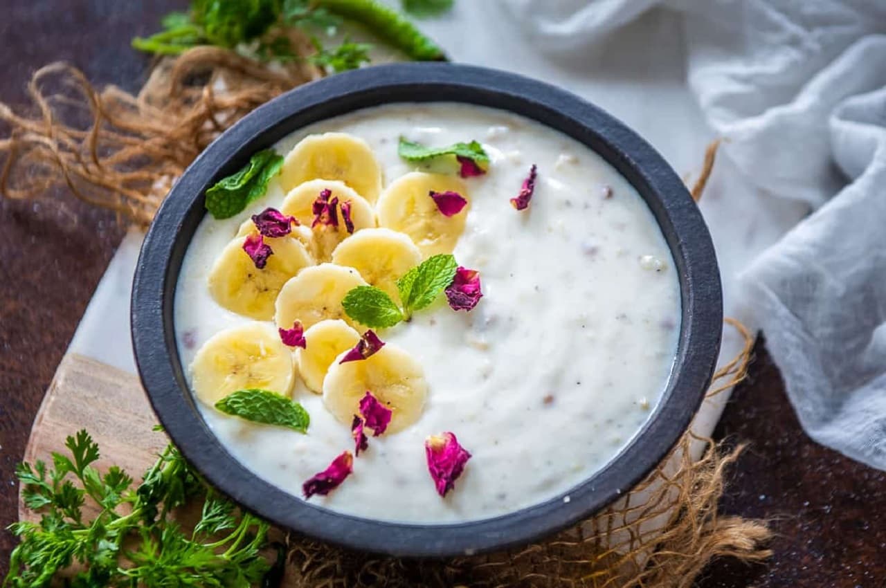 Janmashtami 2022 Banana Raita Recipe: जन्माष्टमी स्पेशल प्रसाद की थाली में शामिल करें केले का मीठा रायता, जानें रेसिपी