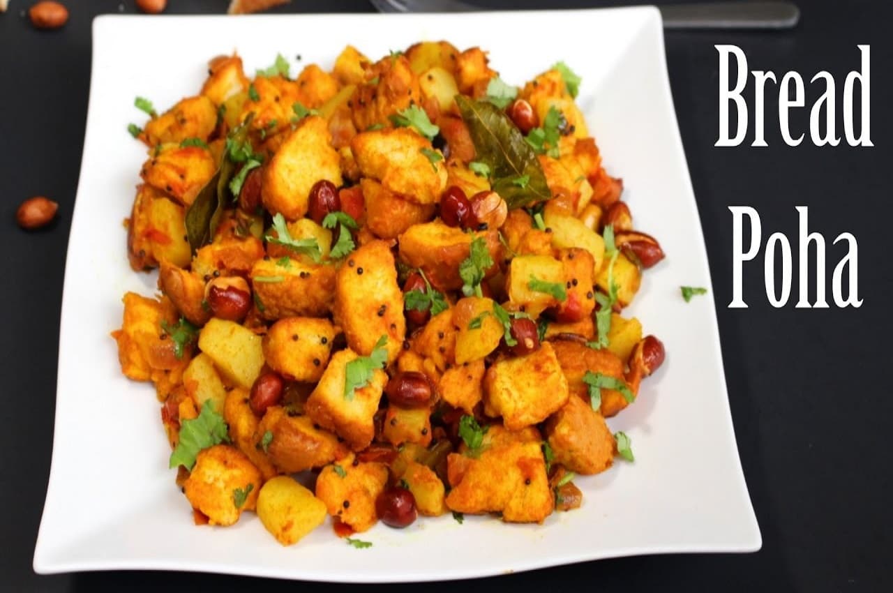 Bread Poha Recipe: सैंडविच खाकर बोर हो गए हैं, तो स्नैक में बनाएं चटपटा ब्रेड पोहा, जानें रेसिपी