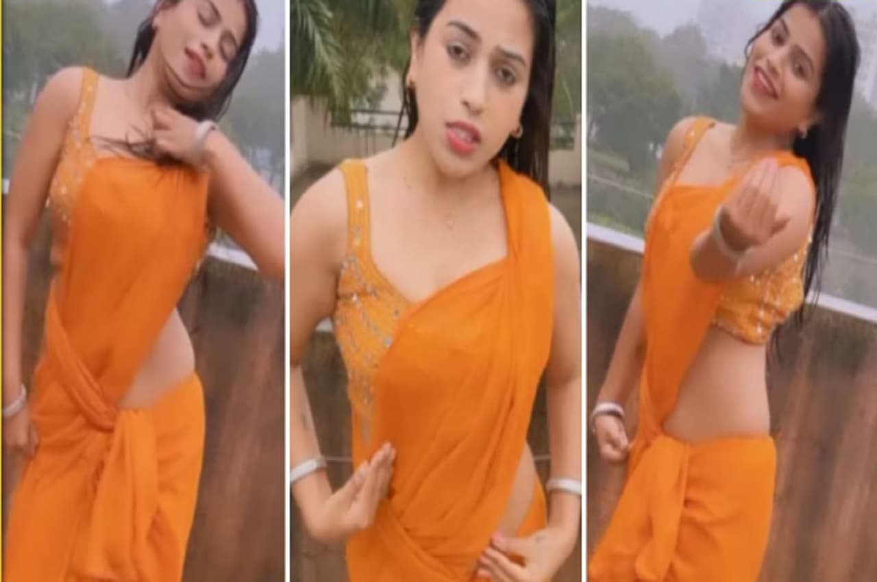 Viral Video: बारिश में जब हॉट साड़ी पहनकर लड़की छत पर पहुंची तो इंटरनेट पर लगा दी आग, गाना भी बजा Tip Tip Barsa