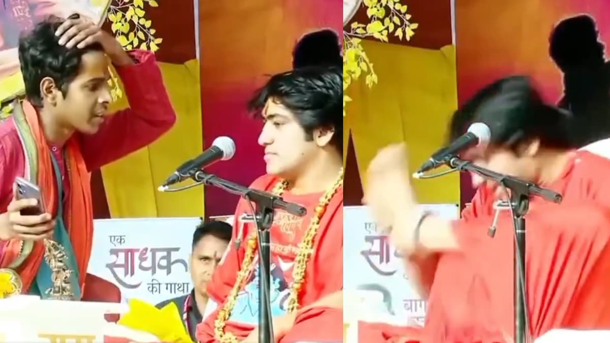 Baba Bagheshwar अपने पैर से क्यों पीटते दिखे माथा? वायरल वीडियो में भक्त ने झल्लाया