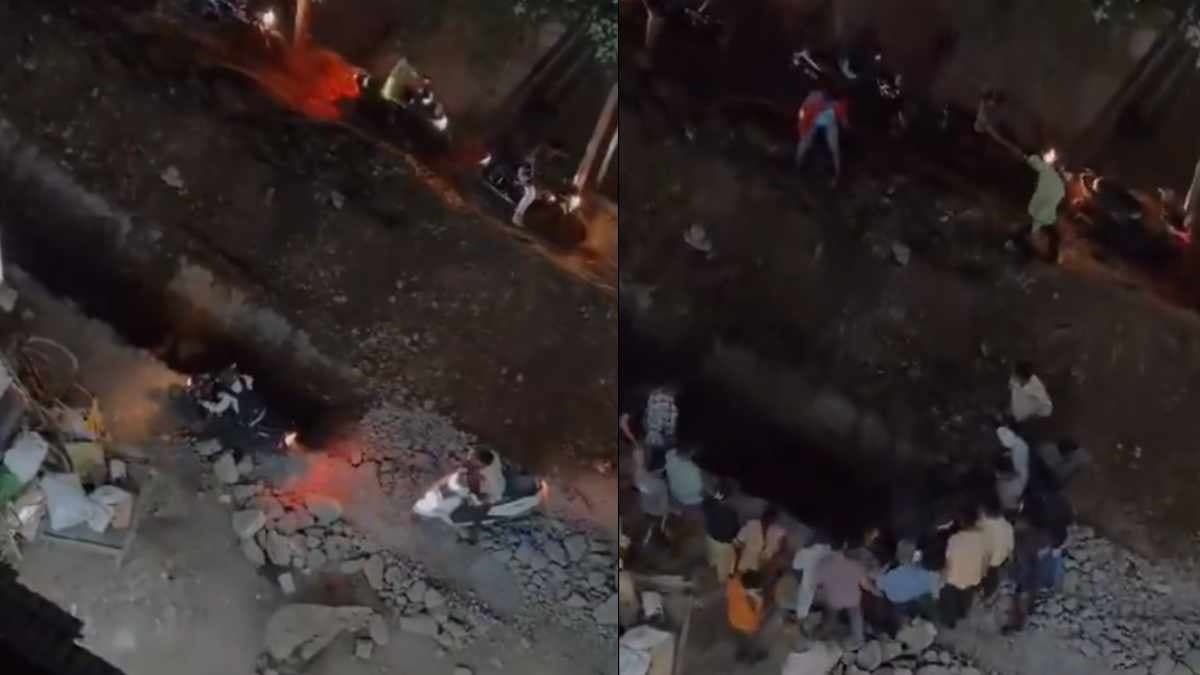 बीच सड़क पर खोदे गए गहरे गड्ढे में बाइक समेत गिरा शख्स, वीडियो हो रहा वायरल