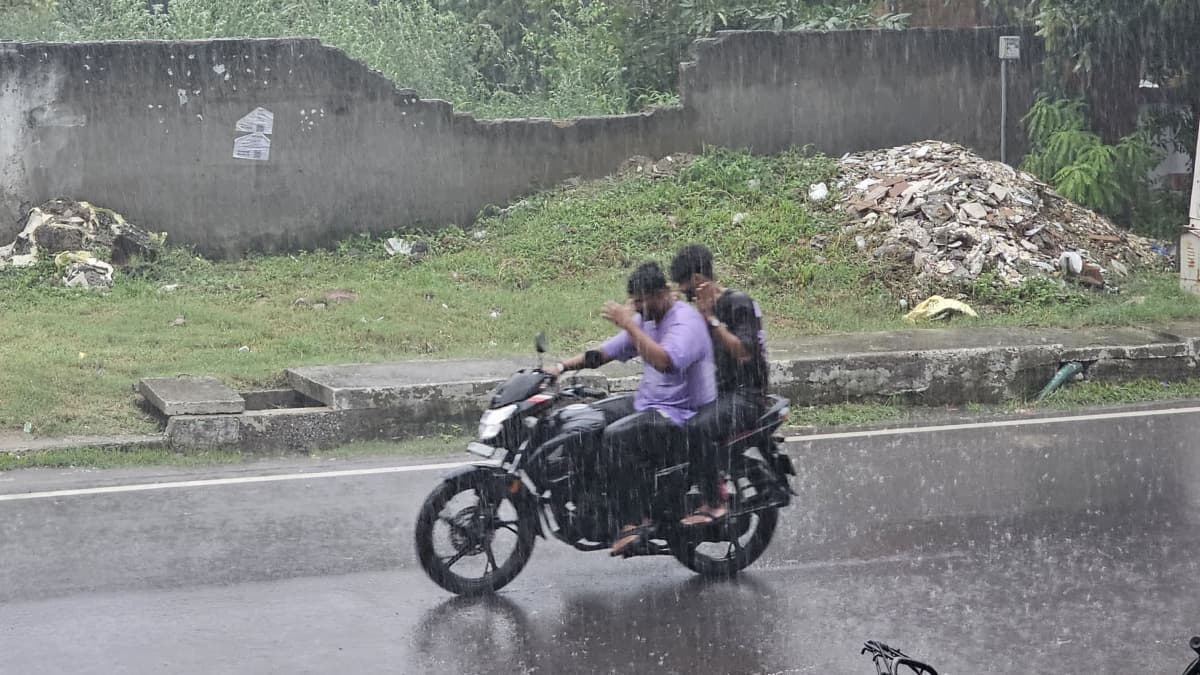 Bikers Going in Rain Greater Noida