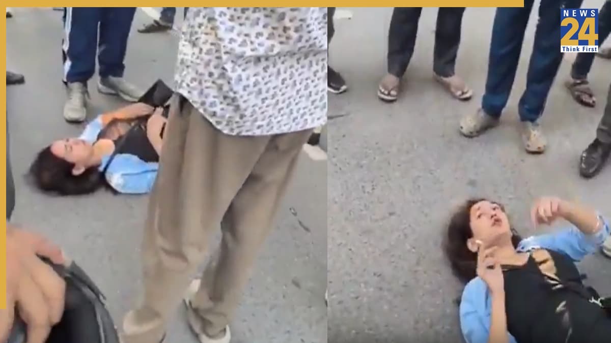 VIDEO: बगल में बोतल, मुंह में सिगरेट… सड़क पर लेटकर महिला ने काटा बवाल, लोग बोले- 'ट्रू जेंडर इक्वालिटी'
