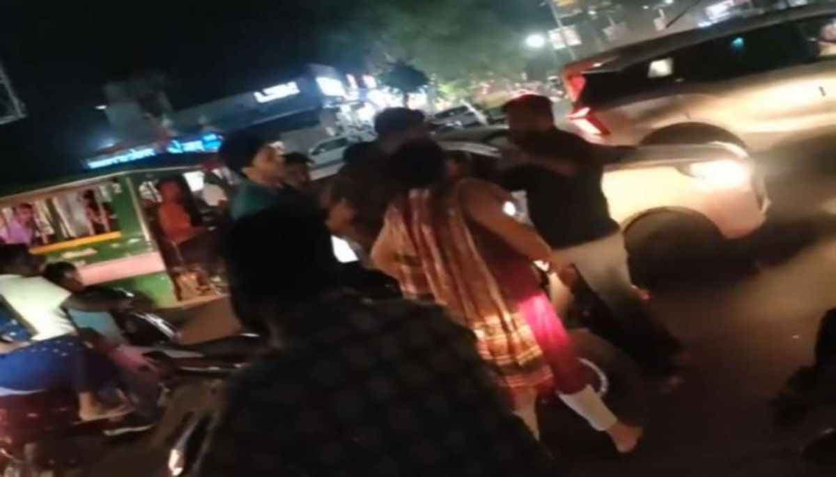 Woman Angry On Called Aunty Beaten ATM Guard With Slipper Woman Angry On Called Aunty Beaten ATM Guard With Slipper