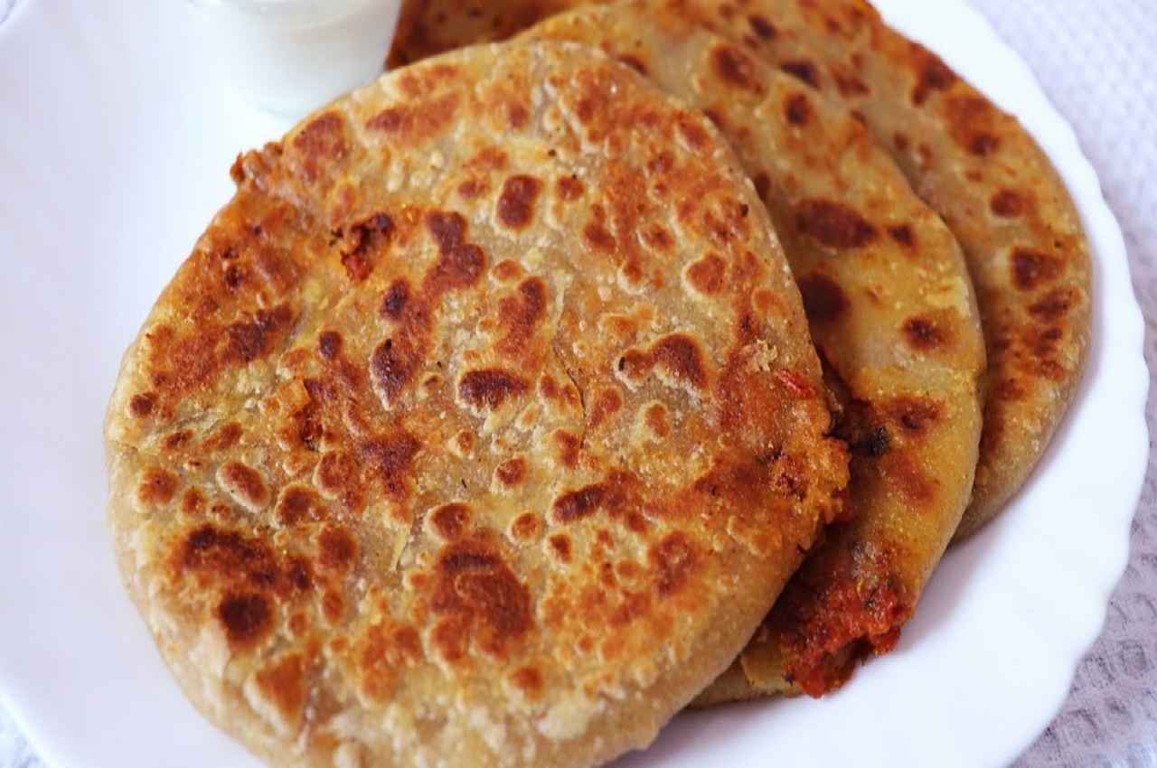 Spicy Coconut Paratha Recipe: Have you ever tried Spicy Coconut Paratha? Follow these simple steps to make Spicy Coconut Paratha