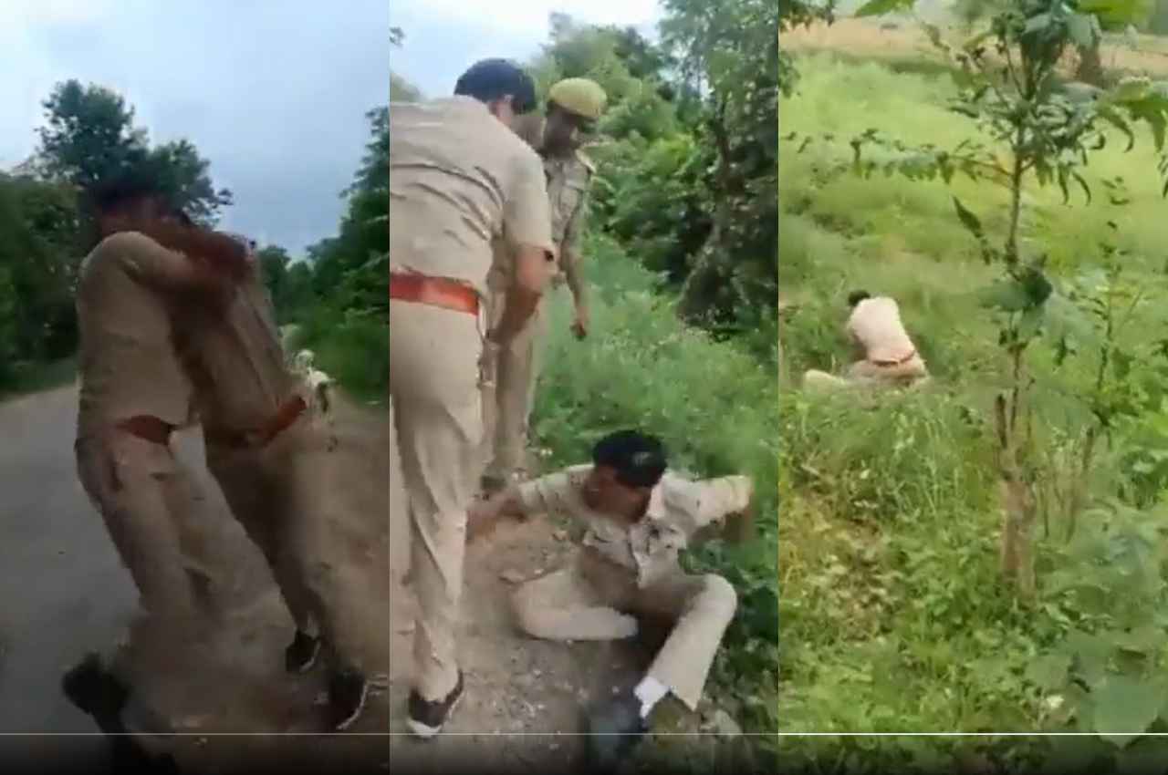 Jalaun: शराब पीने के बाद बीच सड़क पर सिपाही और होमगार्ड में चले लात-घूंसे, देखें Video