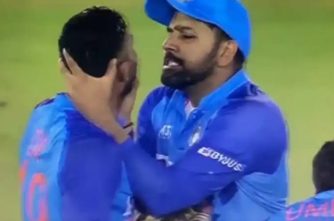 Rohit Sharma Why did hold Dinesh Karthik neck