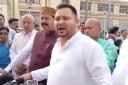 Tejashwi Yadav, ED raid, Tejashwi Yadav on bjp, Enforcement Directorate raid, Tejashwi Yadav railway scam, land for job scam