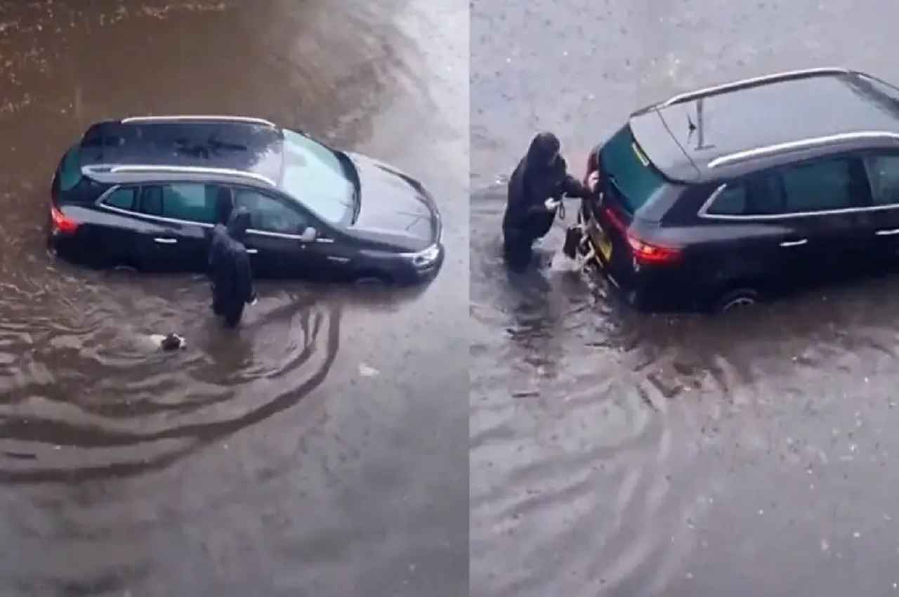 Waah..kya dosti hai; पानी से भरी हुई सड़क से कार को निकालने में डॉगी ने की आदमी की मदद, देखें- Video