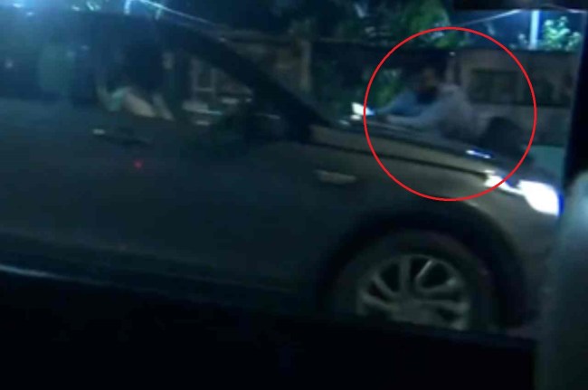 delhi crime news delhi crime delhi news, Ashram Chowk to Nizamuddin, hanging on car bonnet
