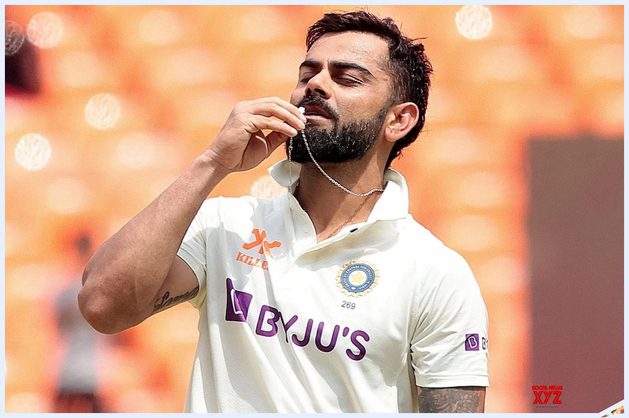 Virat Kohli kisses locket