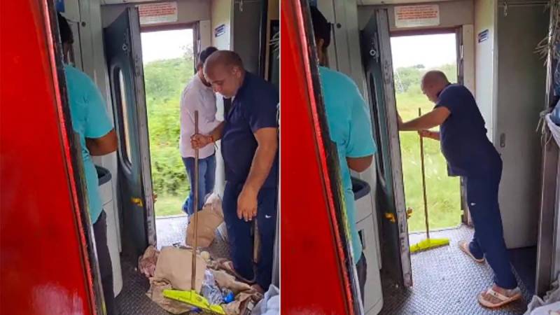 Railway housekeeping staff dumps trash onto tracks video viral swachh bharat