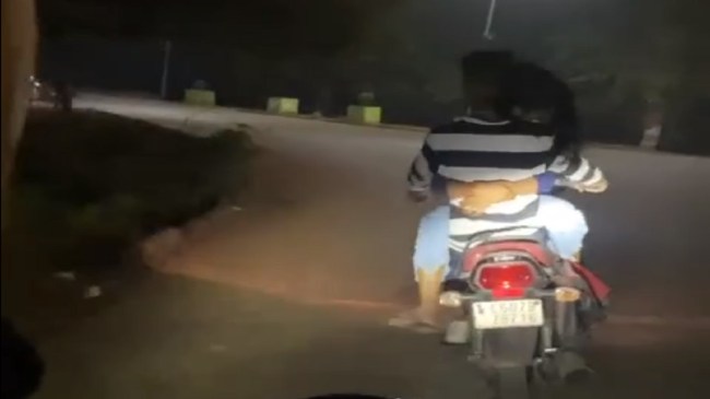 Couple Romance Over Bike