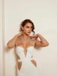 Disha Patani flaunts her cleavage and curvy figure in white side slit bodycon gown Disha Patani bold photos entertainment news