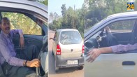 Young man was driving the car sitting on the passenger seat, police issued challan, watch video