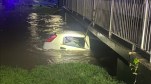 Car Sinking Into Drain, Man Rescued Mother Child