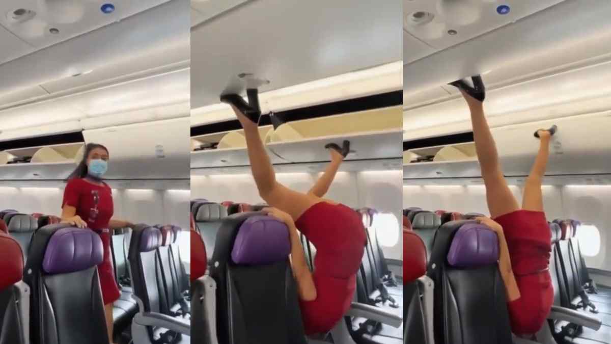 Air hostess upside down inside flight and closes cabin door