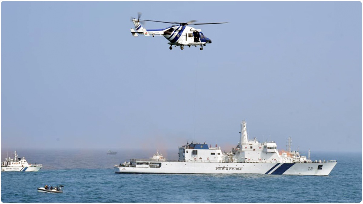 The Indian Coast Guard ship and helicopter during an exercise