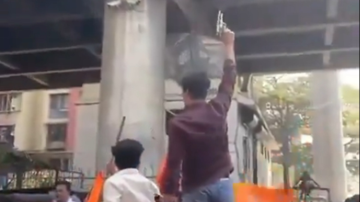 Mumbai Mira Road Video young man waving gun