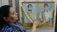 Poornima Kothari showing pictures of her brothers Ram and Sharad Kothari