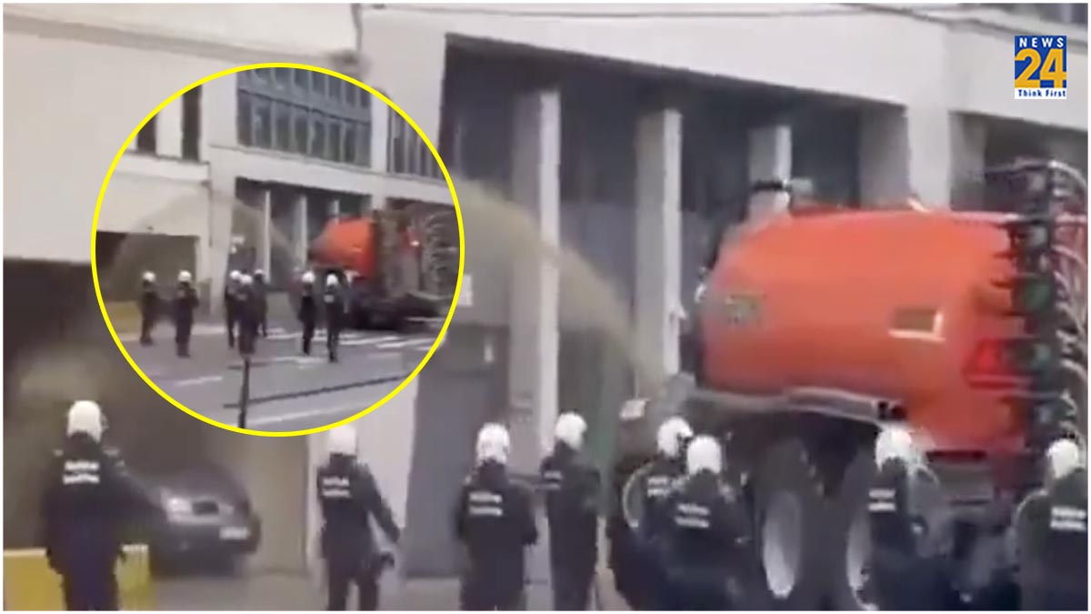 farmers spray Brussels police with liquid manure