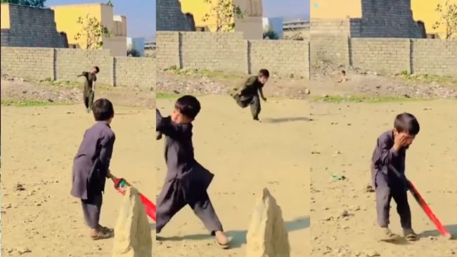 Child Playing Cricket