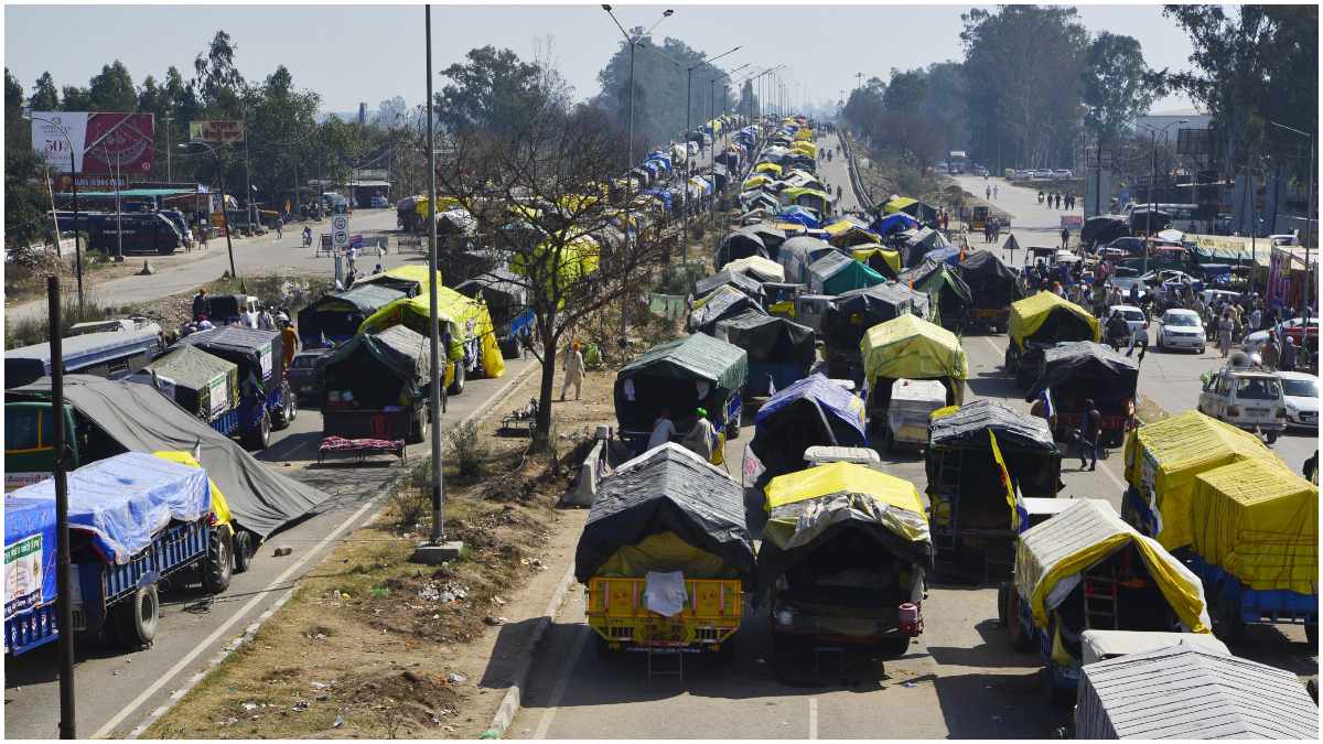 convoy of tractor trolleys of farmers