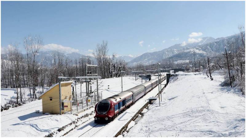 A train on a snow-covered railway track in Anantnag