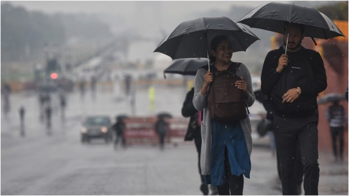 People Using Umbrella During Rain