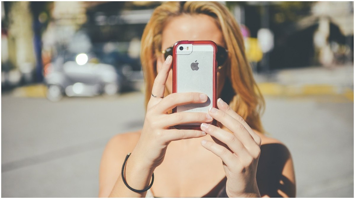 A woman using iPhone