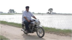 Sukhdev Singh Riding A Bike