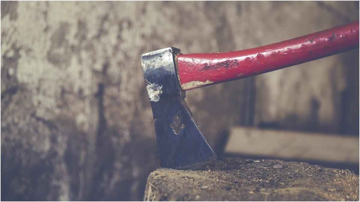 Machete Plunged In A Wood Block