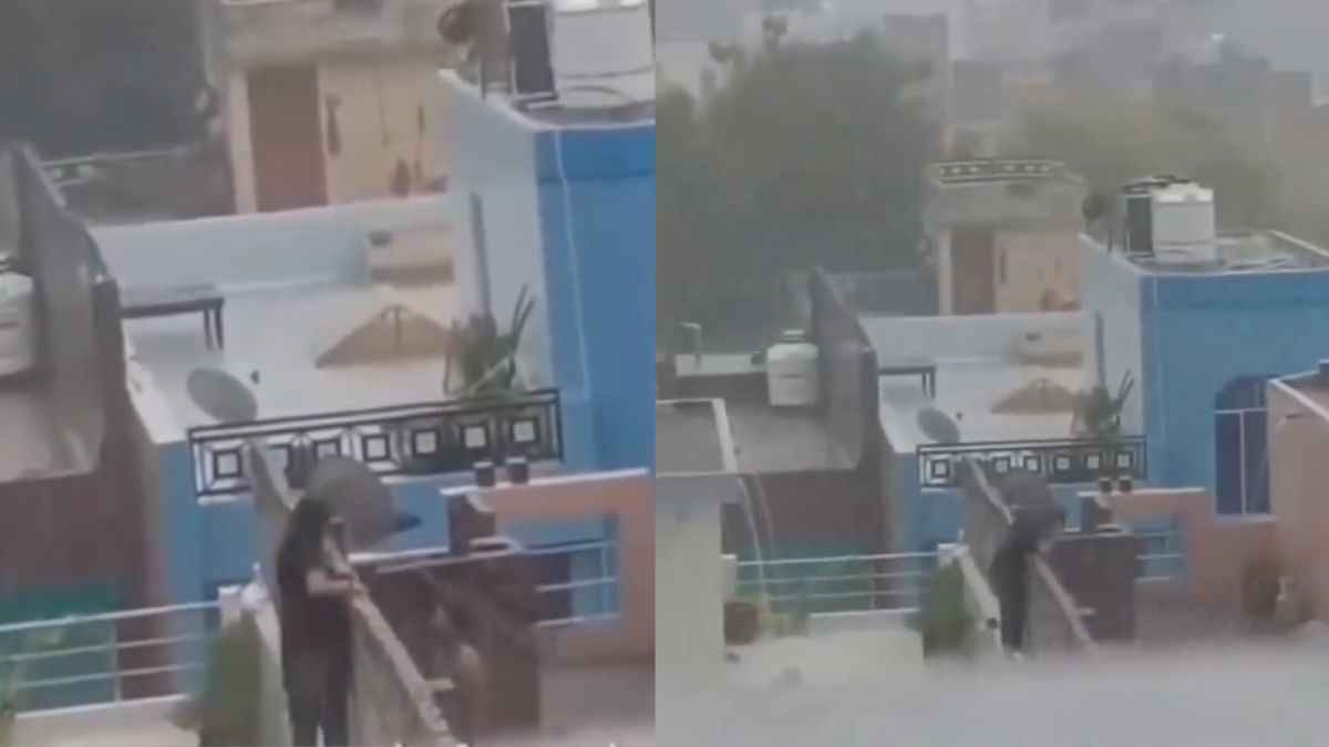बारिश में पड़ोसन संग रोमांस का वीडियो वायरल, यूजर बोला-मानसून ने मौज कर दी