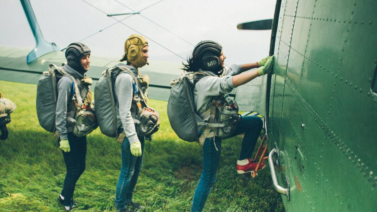 People Boarding A Plane