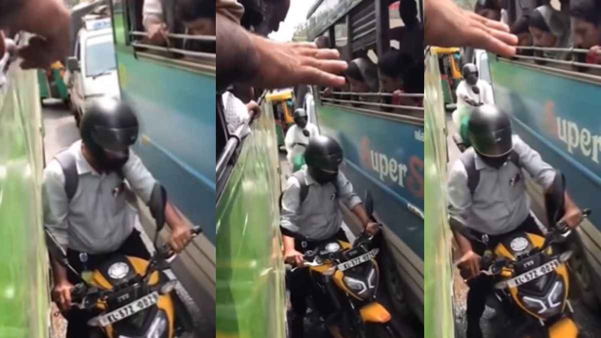 Video: जल्दबाजी पड़ी भारी! दो बसों के बीच फंसा बाइक सवार