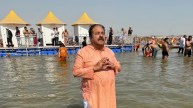 Congress MP Rajeev Shukla Takes Holy Dip At Sangam