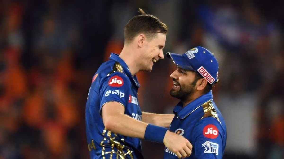 Jason Behrendorff with Rohit Sharma