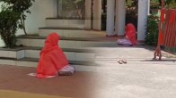 Woman Prays at DM Office