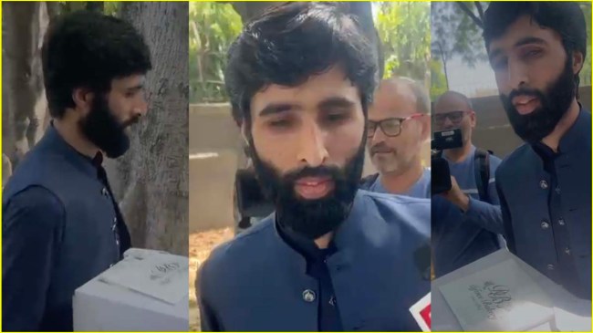 Pakistan Embassy employee with cake