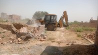 bulldozer action noida