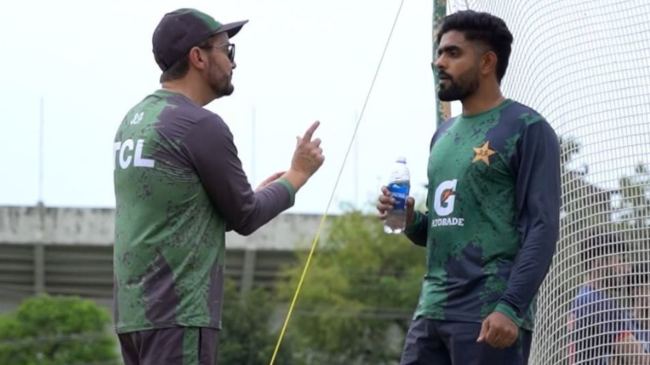 Babar Azam and Mike Hesson