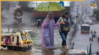 मुंबई में भारी बारिश से जनजीवन बेहाल हुआ।