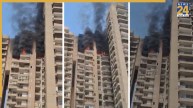 नोएडा के सेक्टर-119 में अरनिया सोसायटी के 21वीं मंजिल पर लगी आग, लोगों में मचा हड़कंप, फायर ब्रिगेड मौजूद