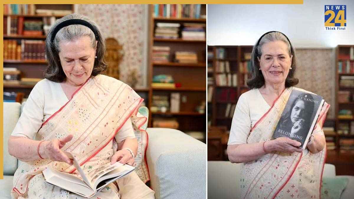 SOINA GANDHI WITH BOOK.jpg